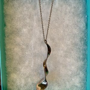 Genuine Tiffany & Co free form sterling silver pendant & chain.